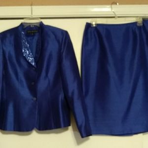 Classy blue suit. Perfect for a formal event.